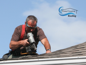 man working on roof